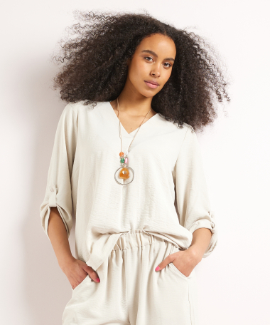 top met v-hals en ketting