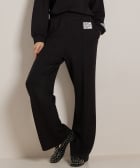 wide fit broek met label
