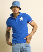 blauwe polo met borstprint